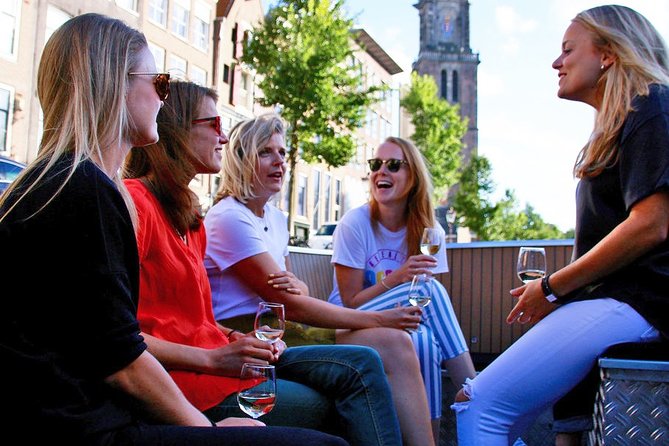 Amsterdam Open Boat Sightseeing Canal Cruise - Seasonal Offers and Weather Conditions