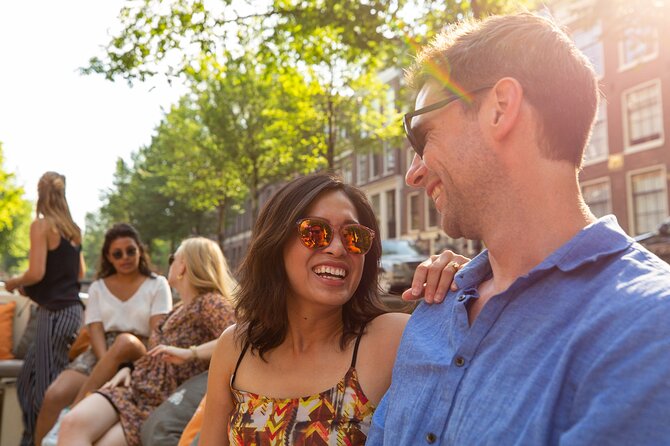 Amsterdam Private Boat Trip With Pizza and Unlimited Drinks - Exploring Amsterdams Highlights