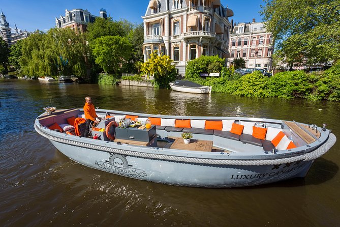Amsterdam Private Boat Trip With Skipper, Burger and Beers - Landmarks Explored