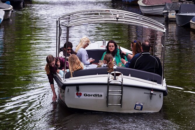 Amsterdam Private Canal Cruise With Live Guide and Drinks - Practical Information and Accessibility