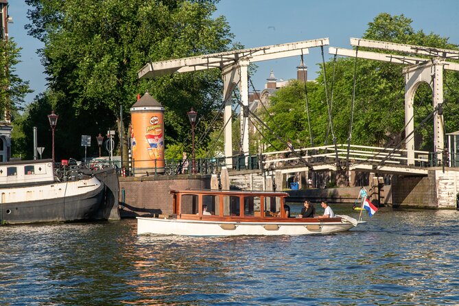 Amsterdam Private Dinner Cruise With Drinks and 2-course Dinner - Meeting Point and Pickup