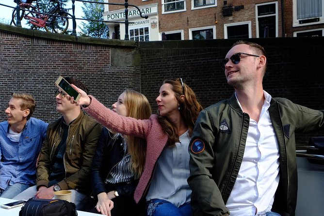 Amsterdam Small-Group Canal Cruise Including Snacks and Drinks - History and Culture
