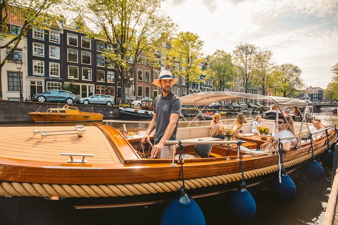 Amsterdam Small-Group Evening Canal Cruise Including Wine, Craft Beer, Cheese - Inclusions and Amenities