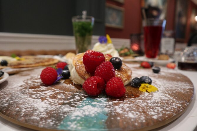 Amsterdam Small-Group Walking Tour With Typical Dutch Pancake - Taking in Dutch Culture