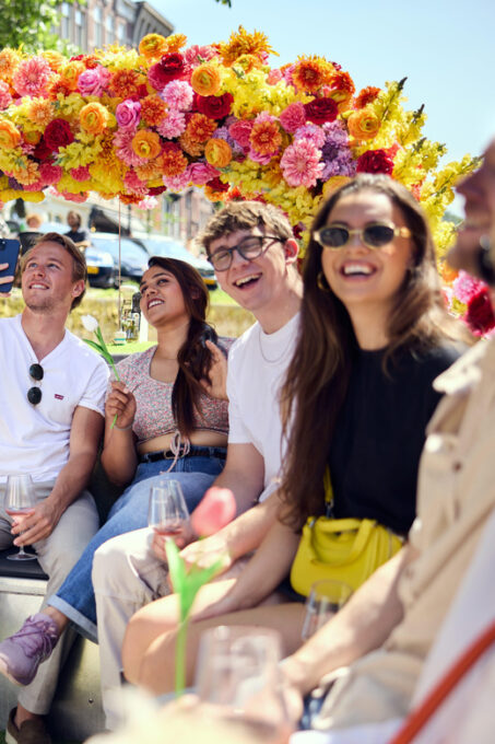 Amsterdam: the Original Flower Boat With Local Guide and Bar - Guide Expertise and Storytelling