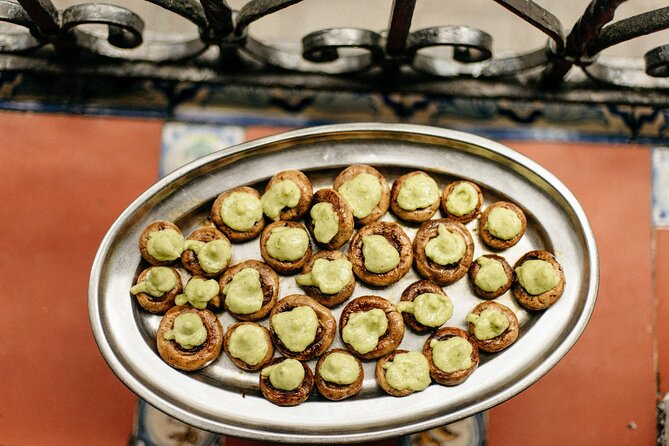 An Evening Out in Seville: Triana Neighborhood Tapas Tour - Discovering Local Drinks and Flavors