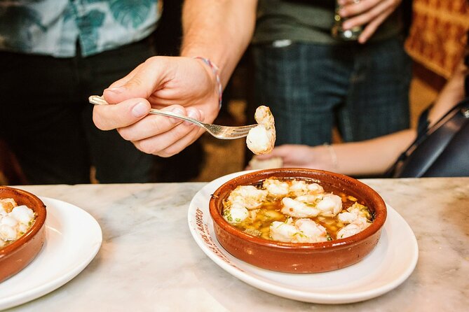 An Evening Out in Seville: Triana Neighborhood Tapas Tour - Tour Details and Inclusions