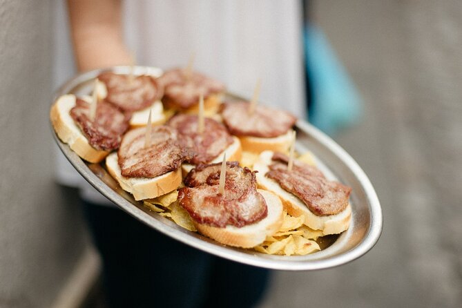 An Evening Out in Seville: Triana Neighborhood Tapas Tour - Meeting Point and Arrival Instructions