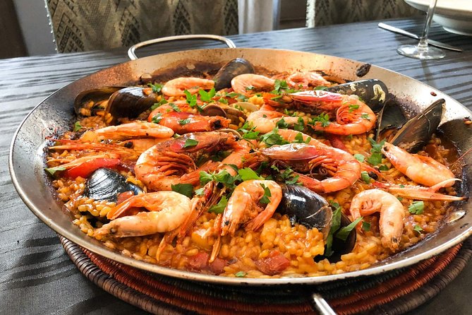 An Interactive Market Tour and Fun Paella Class in Barcelona - Key Points