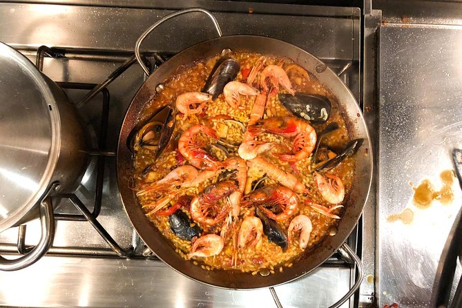 An Interactive Market Tour and Fun Paella Class in Barcelona - Meeting Point and Time