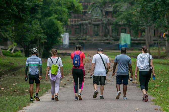 Angkor Sunrise Bike Tour With Breakfast and Lunch Included - Mysterious Ta Prohm Ruins