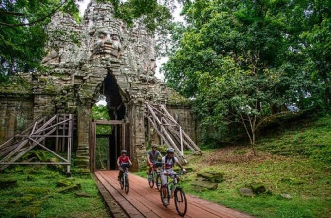 Angkor Wat: Guided Sunrise Bike Tour W/ Breakfast and Lunch - Navigating Trails and Roads