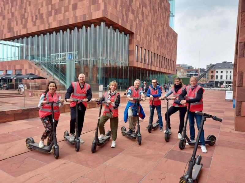 Antwerp: City Highlights E-kickscooter Tour - Experience and Guided Tour