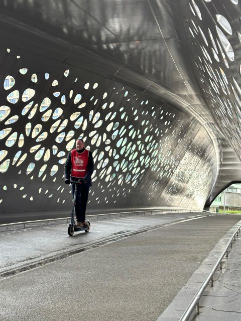 Antwerp: City Highlights E-kickscooter Tour - Age Requirement