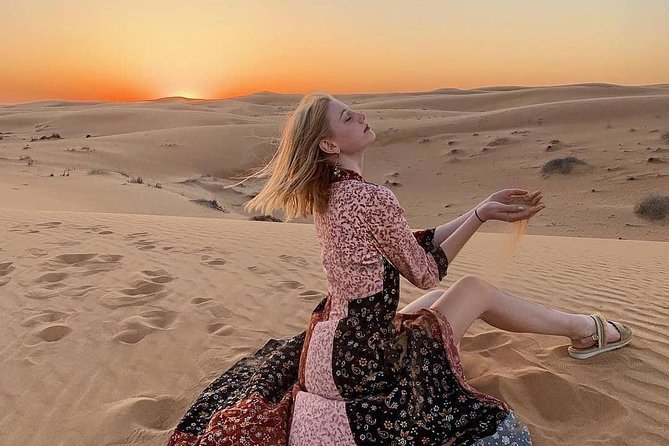 Arabian Desert Safari With BBQ Dinner Camel Ride, Sand Boarding - Dress-up Experiences