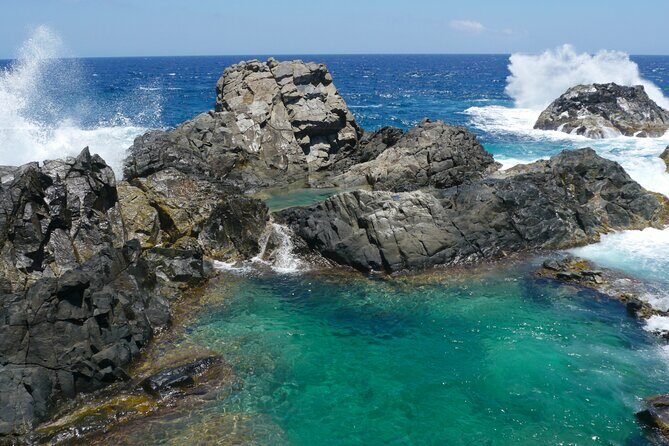 Arikok Sunrise Hiking Tour to Natural Pool + Transportation - Key Points