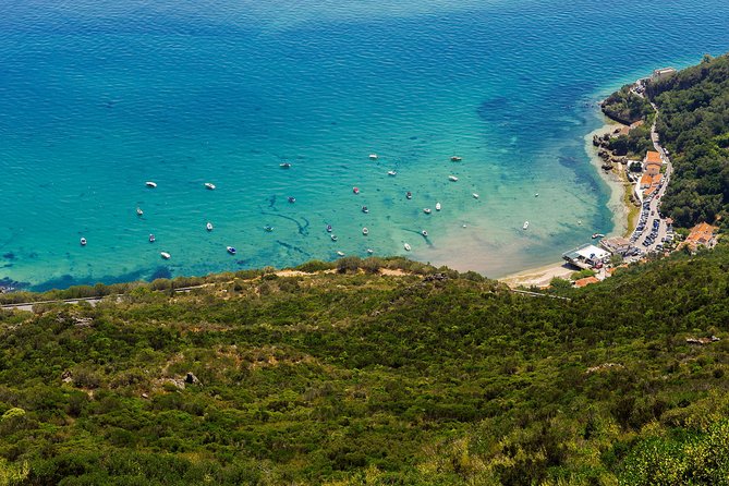 Arrabida and Sesimbra Small-Group Day Trip From Lisbon With Wine Tasting - Discovering Palmela Castle and Wines