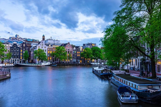 Arrival Transfer: Airport AMS to Amsterdam by Business Car - Booking Process and Policies