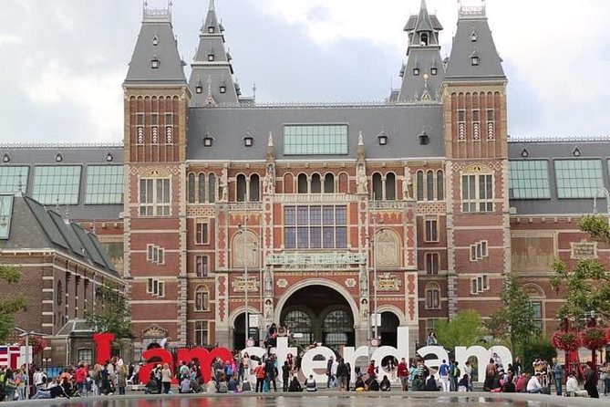 Arrival Transfer: Airport AMS to Amsterdam by Business Car - Operating Hours and Availability