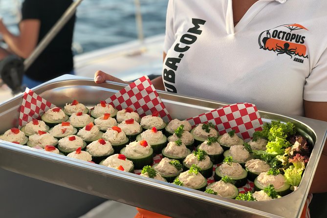 Aruba Happy Hour Sunset Sail With Savory Bites and Cocktails - Boarding and Check-in