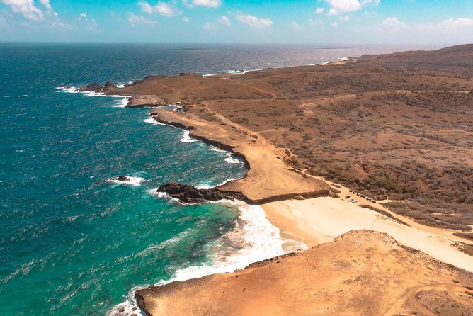 Aruba Jeep Tour: Natural Pool, Caves, and Baby Beach Adventure - Natural Pool and Caves