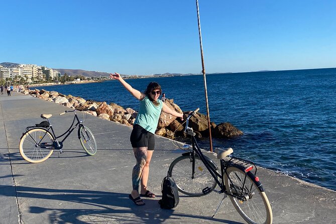 Athens Coastal Bike Tour and Swimming Adventure - Tour Guide Highlights