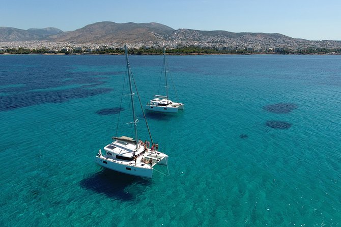 Athens Private Luxury Catamaran Cruise With Traditional Greek Meal and BBQ - Complimentary Welcome Drink and Amenities