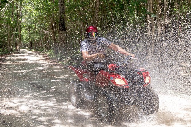 ATV Mud Kicking and Snorkeling by Boat in Cozumel - ATV Adventure in the Jungle