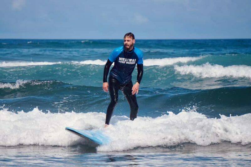 Auckland: Group Surfing Lesson with Muriwai Surf School - Key Points