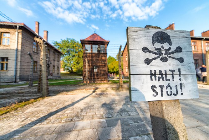 Auschwitz & Cracow From Warsaw Heartbreaking Tour With Pick up - Auschwitz Museum Exploration
