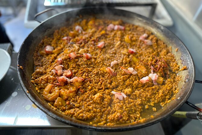 Authentic Paella in Madrid: a Hands-On Class With Tapas & Sangria - Cancellation Policy and Pricing