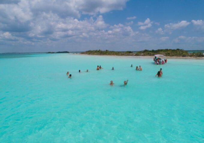 Bacalar: Pontoon Ride to Lagoon and Cenote Azul Exploration - Pontoon Ride on Bacalar Lagoon