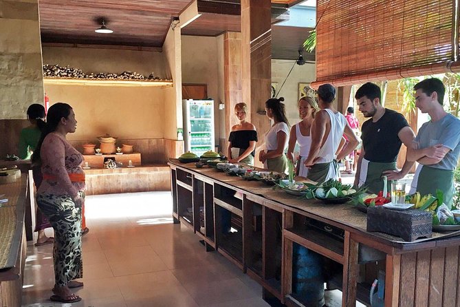 Balinese Cooking Class With Traditional Morning Market Visit - Savoring Masterpieces as Sit-Down Meal