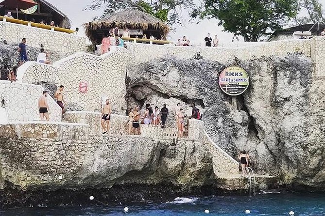 Bamboo Rafting and Limestone Foot Massage With Ricks Cafe Private Tour - Ricks Cafe Experiences