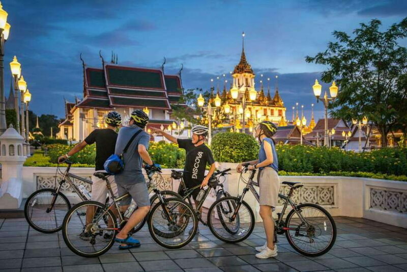 Bangkok: Night Bike Tour with Temples & Flower Market Visit - Authentic Experiences & Traveler Insights