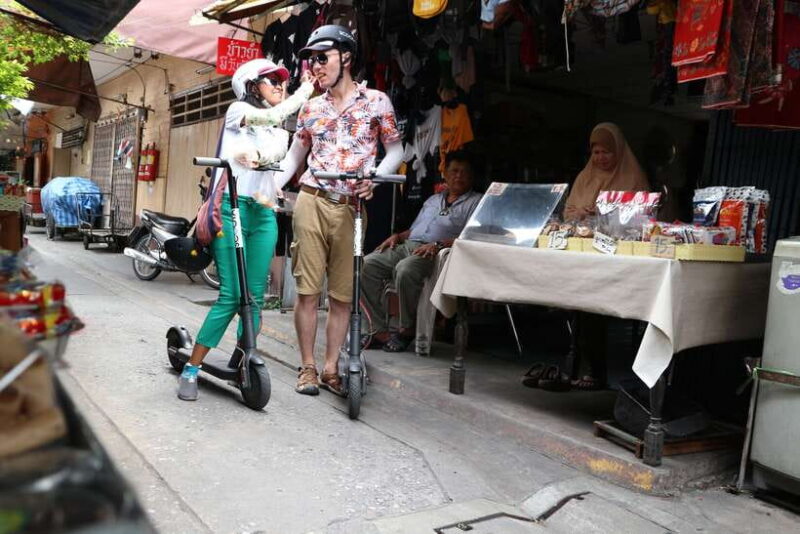 Bangkok: Riverside E-Scooter Adventure With Streetfood Snack - Itinerary Highlights