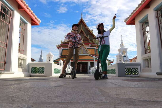 Bangkok: Riverside E-Scooter Adventure With Streetfood Snack - Exploring Bangkok on Electric Scooters