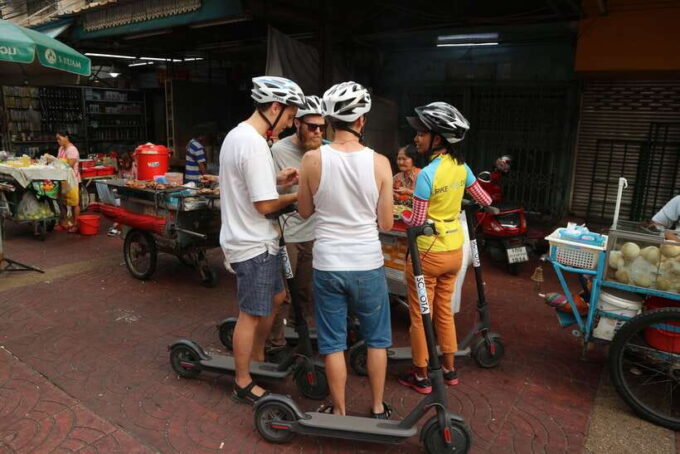Bangkok: Riverside E-Scooter Adventure With Streetfood Snack - Discovering Local Street Food Delights
