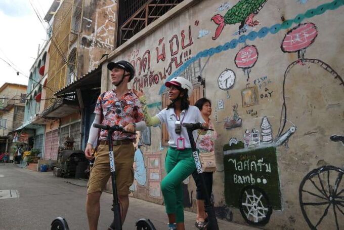Bangkok: Riverside E-Scooter Adventure With Streetfood Snack - Embracing the Riverside Charm