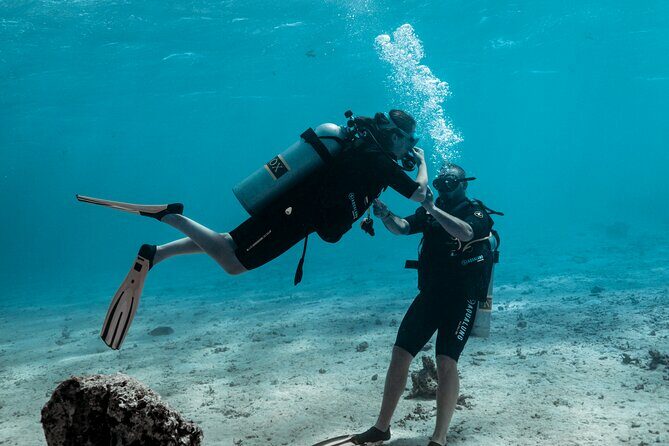 Baptism diving in the turquoise waters of Tahiti - What the Tour Includes and Its Unique Appeal