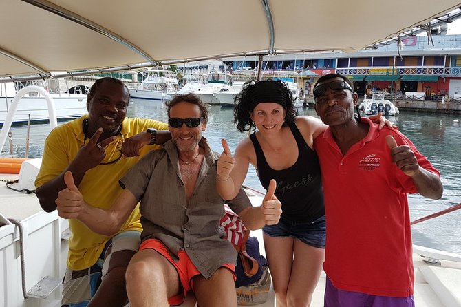 Barbados Catamaran Snorkel Cruise With Lunch and Open Bar - Sipping Refreshing Drinks at the Open Bar