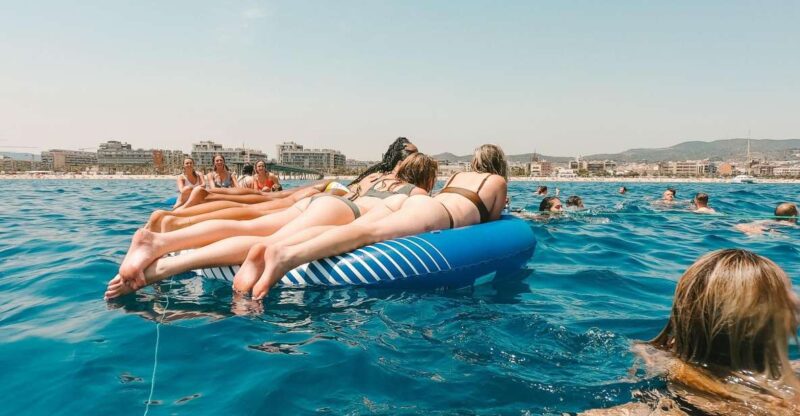 Barcelona: Boat Party With Paella Lunch and Swim - Key Points