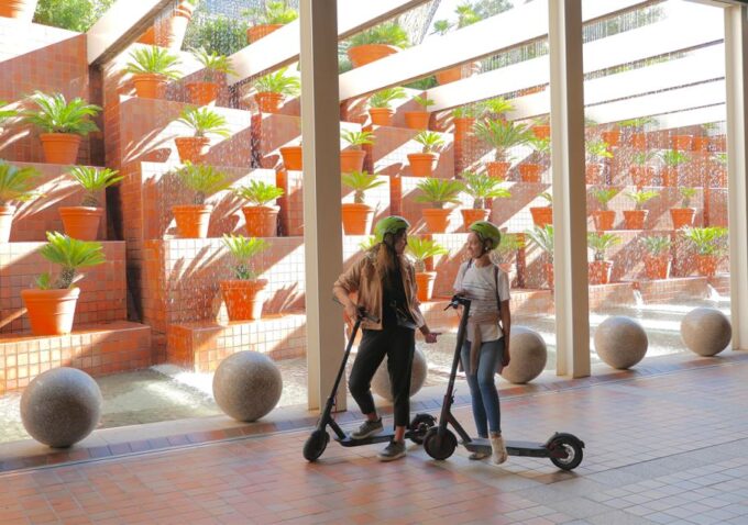 Barcelona: City Highlights Guided Tour by Electric Scooter - Booking and Cancellation