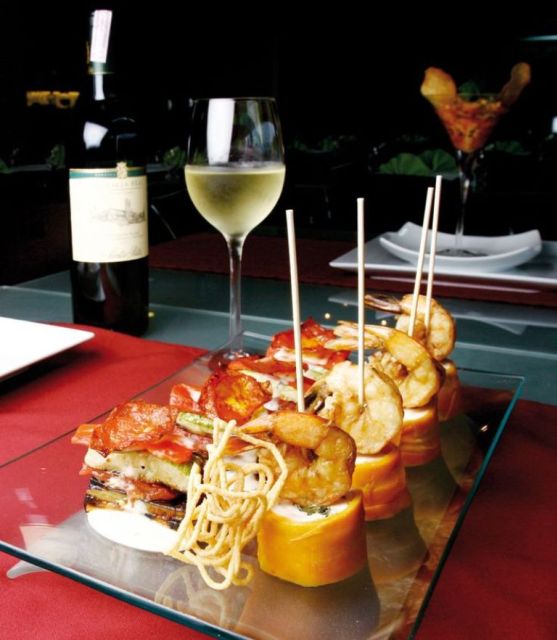 Barcelona: Evening Walking Tour in the Gaudi Area With Tapas - Authentic Regional Food Tastings