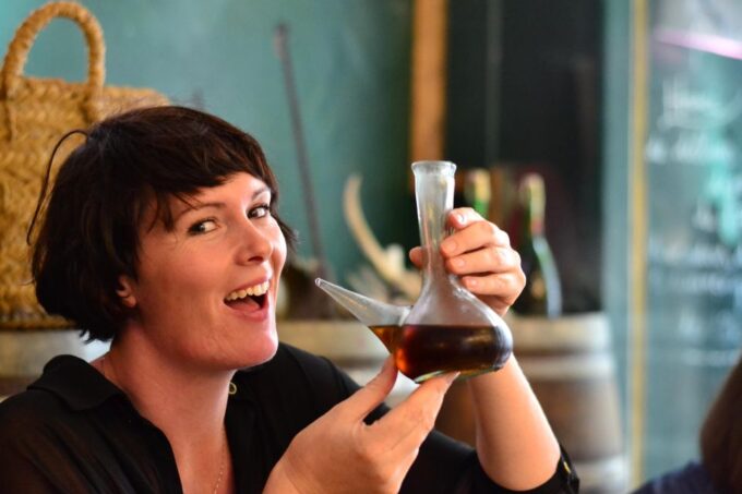 Barcelona: Food & Market Tapas Tour - Try Drinking From Porron
