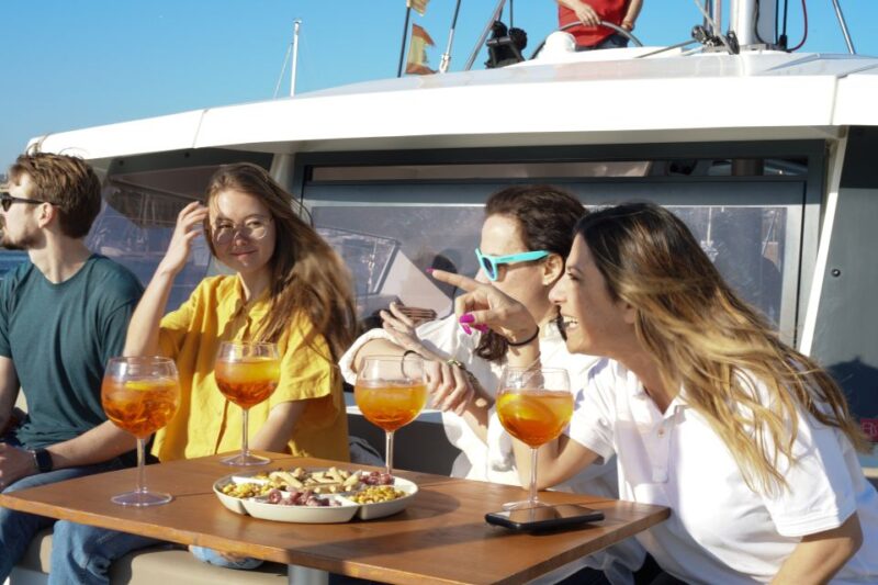 Barcelona: Lunch or Dinner Catamaran Sailing Tour - Highlights of the Tour