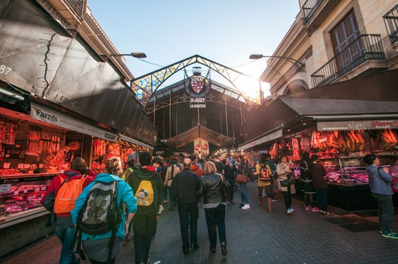 Barcelona: Paella Cooking Experience & Boqueria Market Tour - Traditional Tapas Preparation