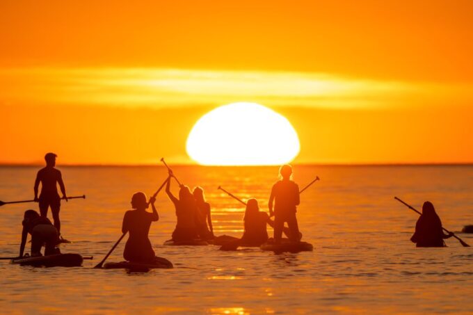 Barcelona: Sunrise Paddleboarding With Instructor and Photos - Booking and Cancellation Policy
