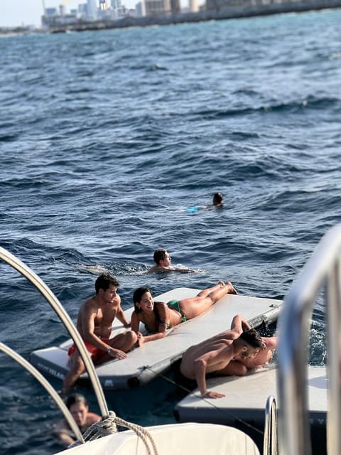 Barcelona: Sunset Boat Party With Pre-Party, Drinks & Snacks - Key Points