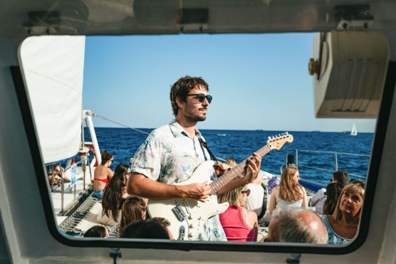 Barcelona: Sunset Catamaran Cruise With Live Music - Onboard Bar and Catering